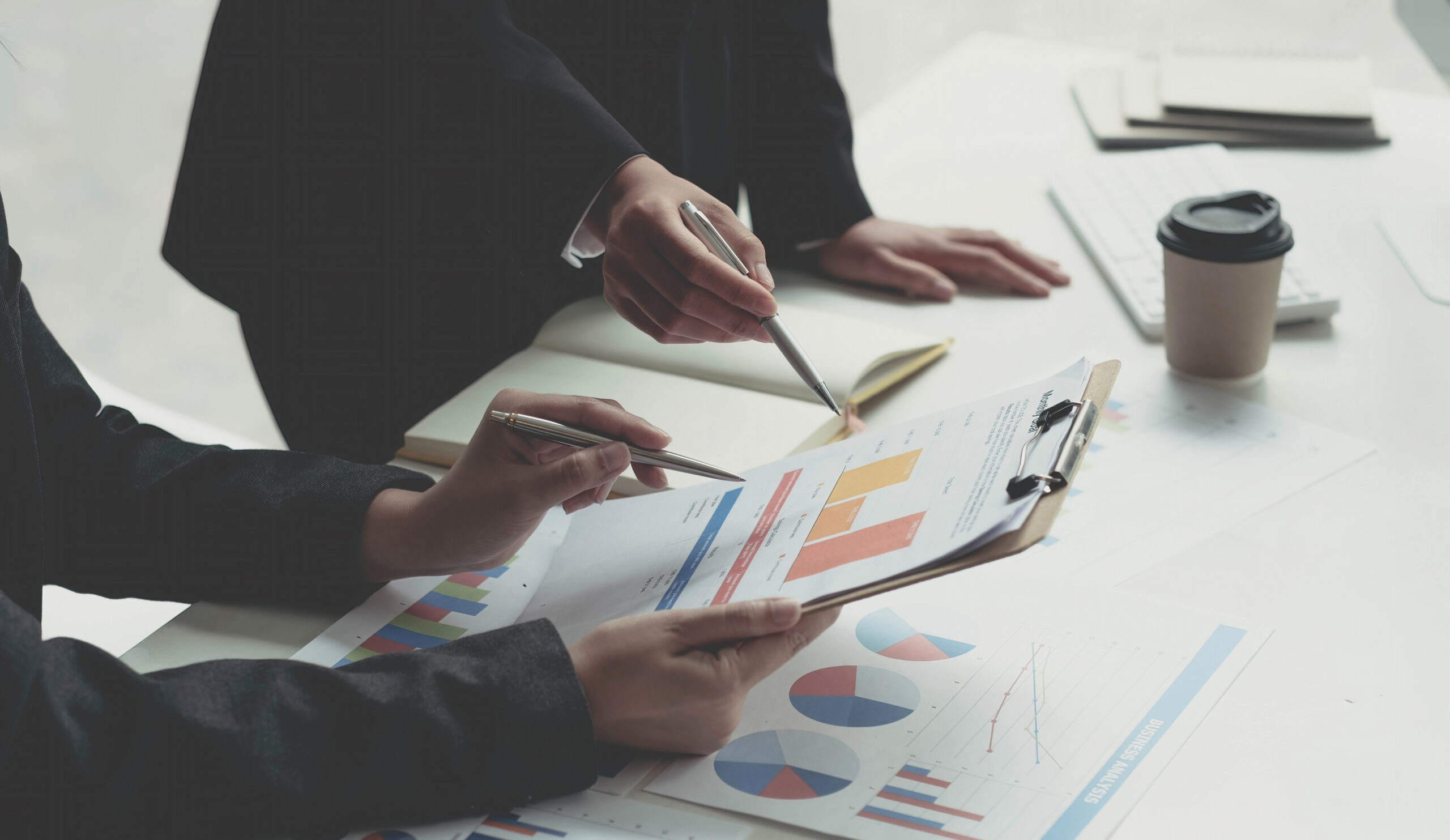 Fund managers team consultation and discuss about analysis Investment stock market by digital tablet.